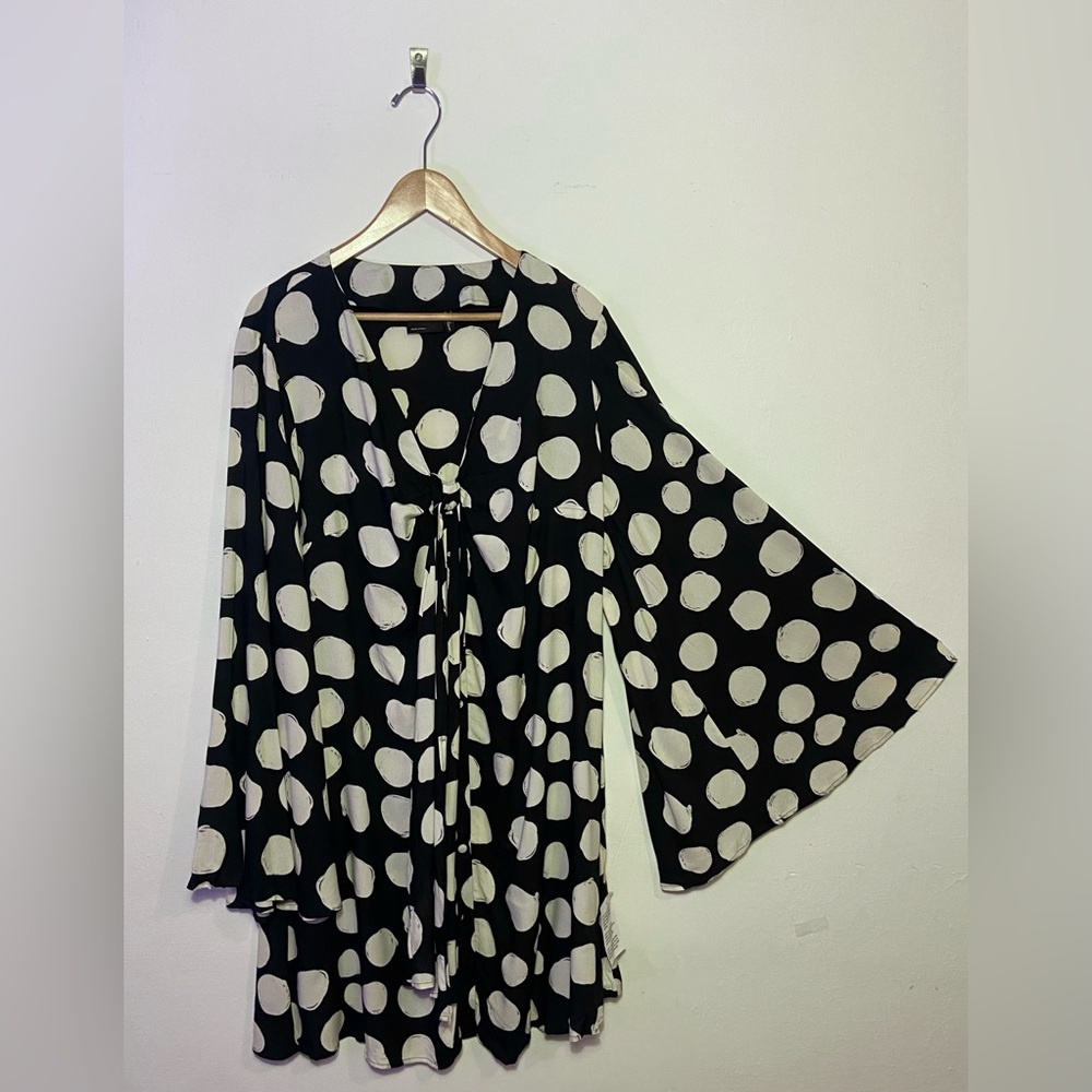 ASOS Curve mini shirt dress with tie front and flared sleeves in spot print